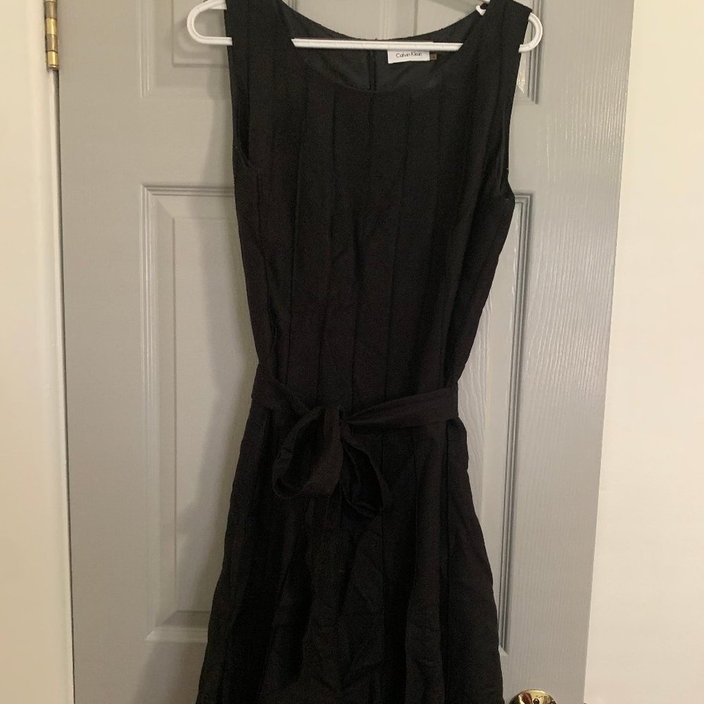 Black cocktail dress with flowy A-line skirt